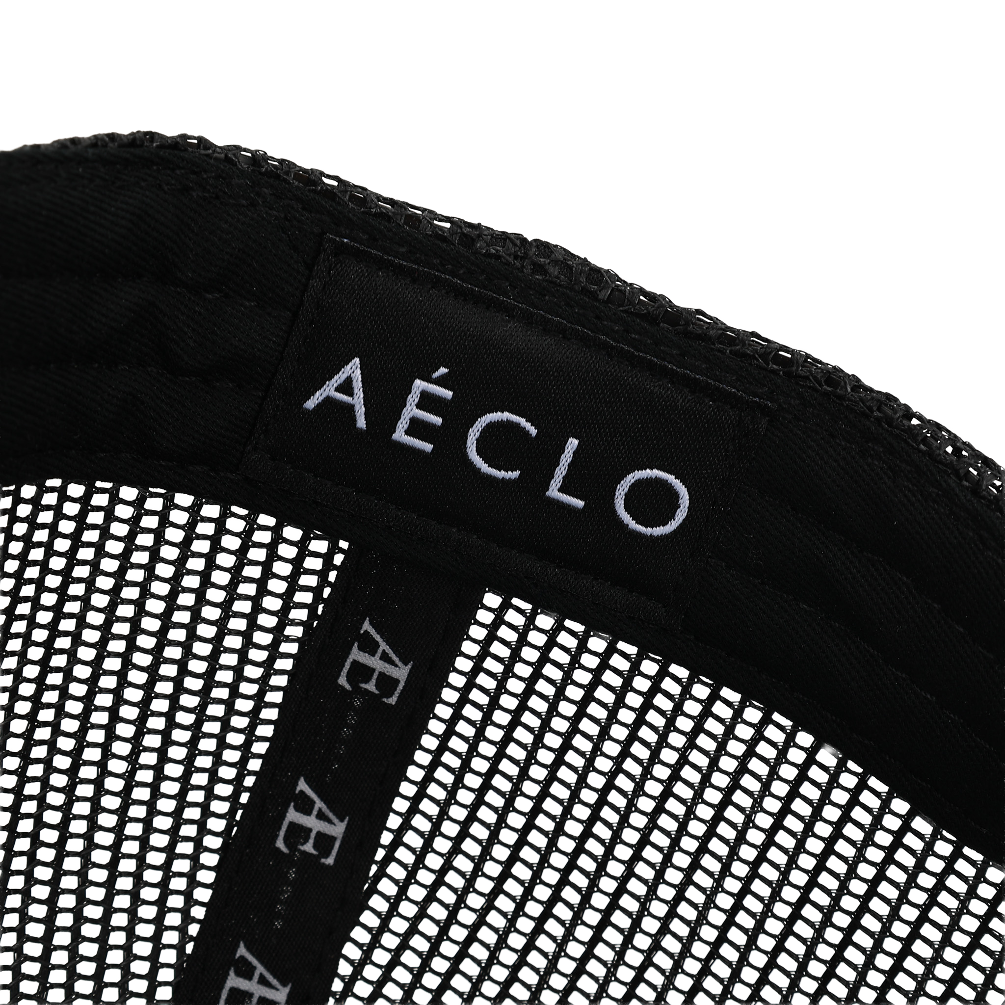Close-up of a black mesh product with 'Aéclo' branding on a white background