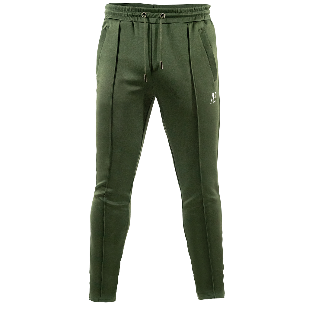 A forest green slim-fit bottoms with subtle branding on the upper left thigh.