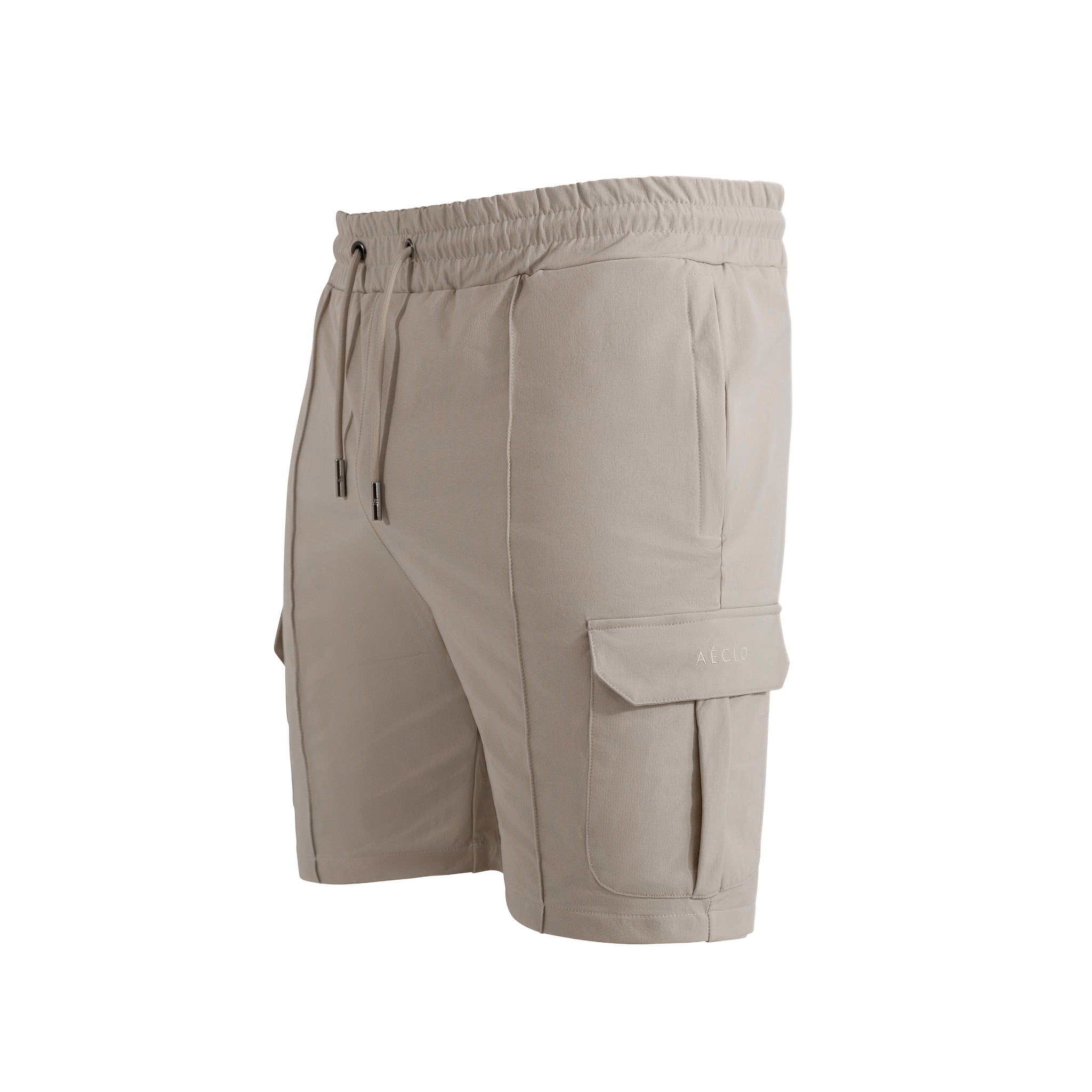 Side profile of beige cargo shorts with tonal embroidery and flap pockets