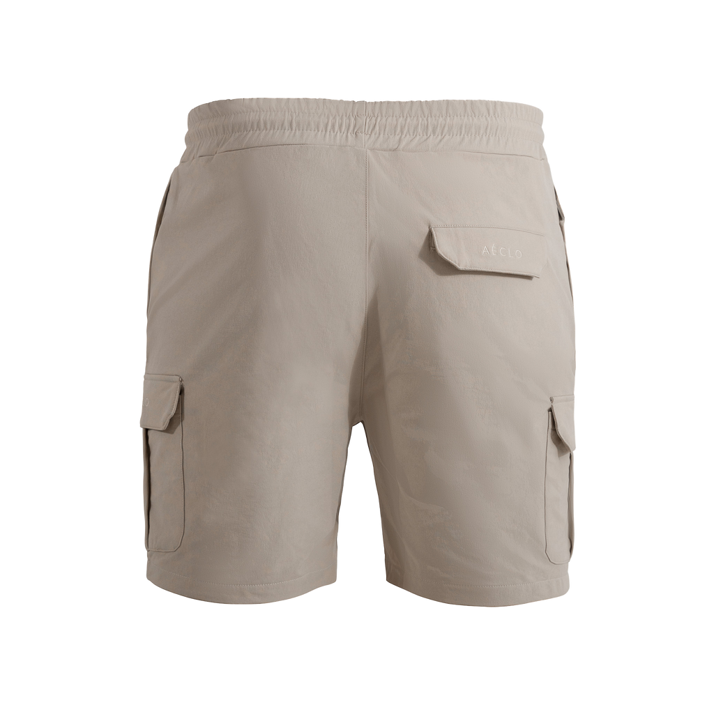 Beige cargo shorts on a white background