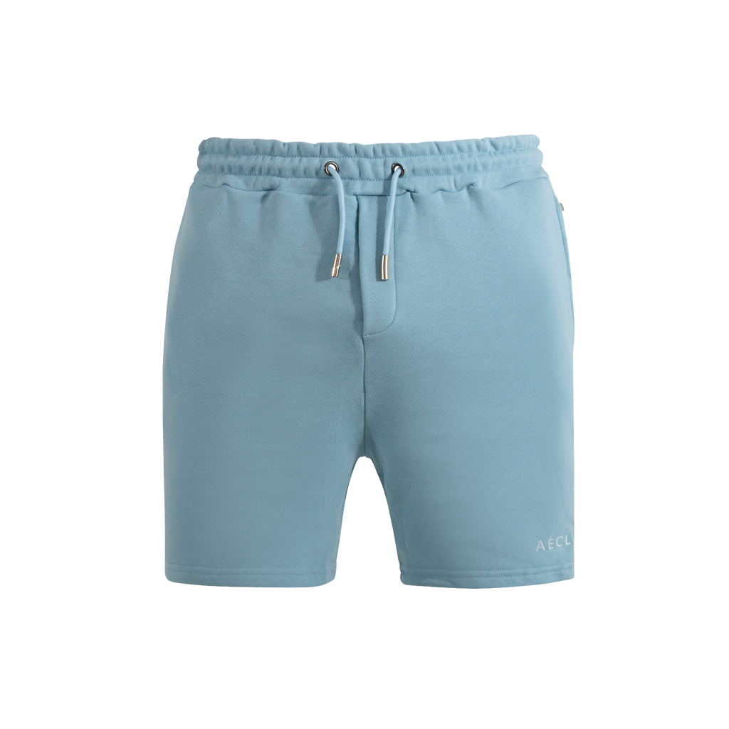 Light blue shorts with drawstring on a white background